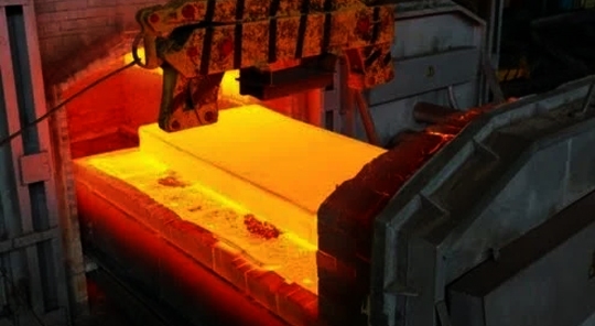 Man Working in Pipe Factory